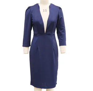 Detailed macro view of navy blue plunging V-neck long-sleeve slim fit autumn dress