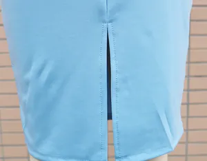 Close-up detail of the neat back slit stitching on a light blue slim-fit bodycon dress.
