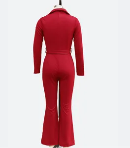 Detailed back view of a sophisticated red long sleeve jumpsuit with flared legs on a mannequin