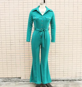 Professional mannequin display of a teal long-sleeve commute jumpsuit with belt