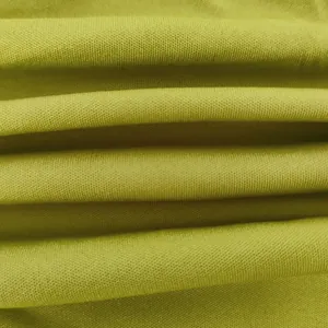 Macro close-up detail of the olive green knit fabric texture for a sexy two-piece clothing set