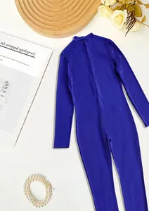Detail view of the back of a blue ribbed long-sleeved jumpsuit with a zipper closure.