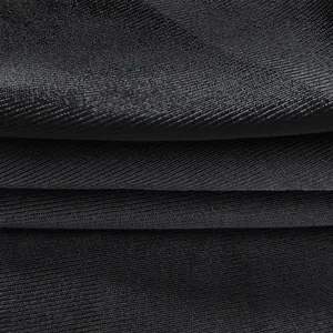 Detailed macro view of high-quality black ribbed fabric texture for elegant women dress