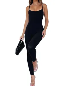 Elegant black spaghetti strap jumpsuit unitard worn by a model on plain white background