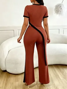 Back view of rust ribbed two-piece set featuring cut-out top and wide-leg pants
