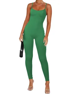 Front view of a slim fit green ribbed jumpsuit for women with spaghetti straps.