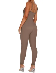 Close-up detail of the brown ribbed backless unitard jumpsuit with spaghetti straps
