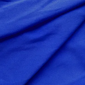 Detailed macro view of high-quality blue jersey fabric texture for women office dress