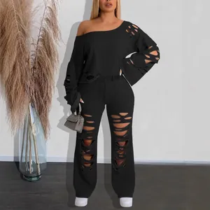 Streetwear two-piece set with off-shoulder distressed sweatshirt and ripped lounge pants
