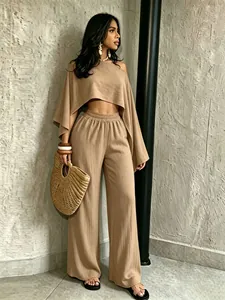 Conjunto chic de 2 piezas para vacaciones con top asimétrico y pantalón ancho