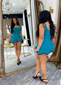 Blue sleeveless mini dress featuring a unique wavy hem with black trim detail.
