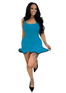 Detailed view of sleeveless blue rib-knit dress with wavy ruffle hem and black trim