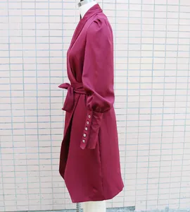 Side view of wine red shawl collar dress with elegant button cuffs and tie-waist