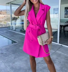 Modern hot pink sleeveless blazer dress with matching waist belt for elegant office wear