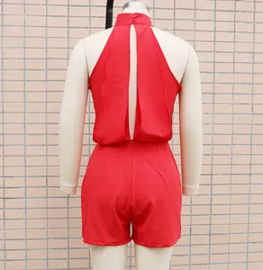 Detailed back view of a red sleeveless mock neck romper with stylish cutout on a mannequin.