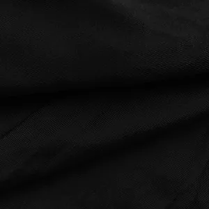 Close-up of high-quality black ribbed knit fabric detail for sexy bodycon dress