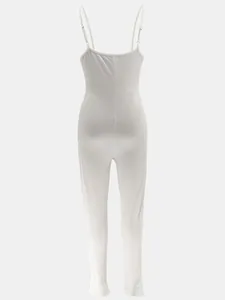 Back view detail of a white ribbed long camisole jumpsuit with spaghetti straps