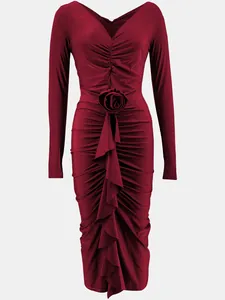 Close-up detail of burgundy long-sleeved V-neck bodycon dress with 3D rose accent.