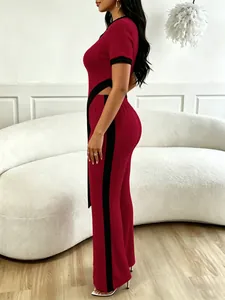 Detailed side view of wine red two-piece set with ribbed texture cutout top and wide-leg pants