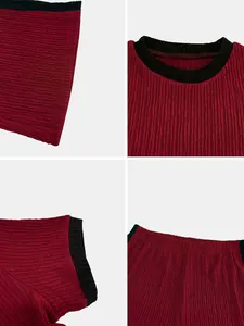 Macro view showing the unique red pleated texture and black trim details of the set