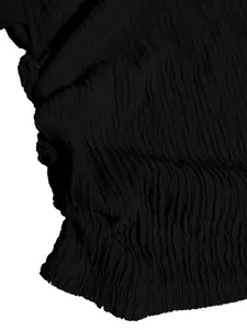 Macro detail shot of black crinkle textured fabric showing high-quality material weave