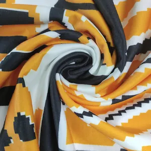 Close-up detail of soft geometric pixelated print on contrast color dress fabric