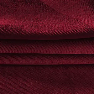 Detail macro view of the premium burgundy ribbed knit fabric for a bodycon dress