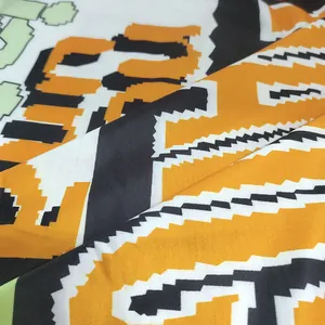 Close-up view of the high-quality pixelated letter print on soft knit hoodie fabric detail
