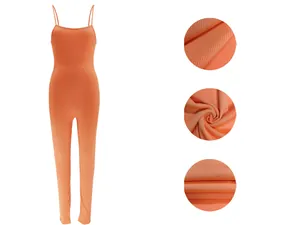 Detail view of orange ribbed sleeveless backless bodycon jumpsuit with fabric texture close-ups