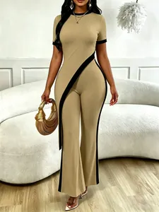 Detailed view of khaki ribbed knit set with black contrast trim and asymmetrical hem