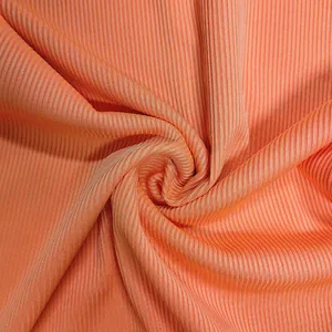 Detailed close-up of orange ribbed knit fabric texture for stylish women's bodysuit apparel