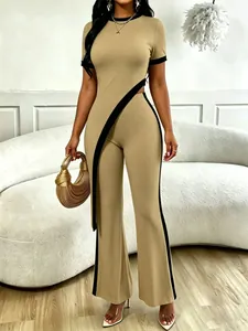 Detail view of the asymmetrical waist cut and ribbed fabric texture of the khaki set.