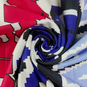 Close-up detail of vibrant contrast letter print fabric with soft texture for hoodie dress