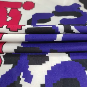 Detailed view of pixelated alphabet print on high-quality knit fabric for women's dress