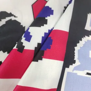Close-up of pixelated color-block print on knitted fabric for women's casual dress