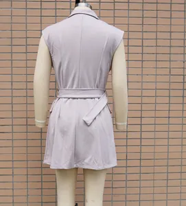 Back view detail showing the waist design of a lavender sleeveless blazer dress with belt