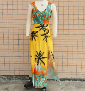 Close-up detail of tropical print two-piece maxi dress set with high slits on mannequin