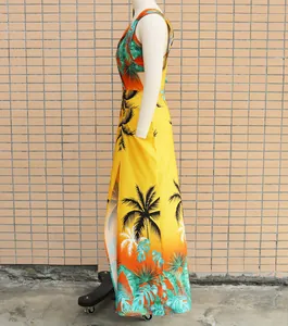 Side view of tropical print two-piece maxi dress set with palm tree design.