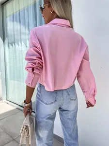 Back view of a pink loose batwing sleeve shirt for stylish women's office wear