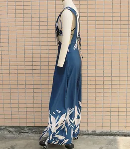 Side profile of a navy blue floral print two-piece vest skirt set on a mannequin