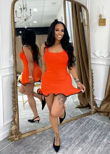 Vibrant orange sleeveless summer tank dress featuring a stylish black wavy ruffled hem