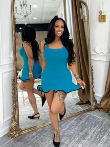 Summer sleeveless slim tank dress with teal body and black wavy ruffled hem