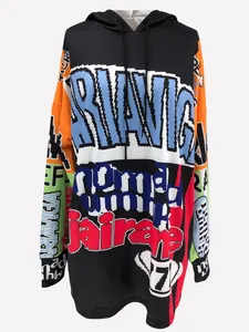 Close-up of oversized hoodie dress with vibrant pixelated letters and color block design.