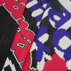 Detailed macro view of the pixelated letter print fabric for casual hoodie dress