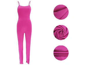 Detail of hot pink rib-knit camisole jumpsuit showing high-stretch fabric texture