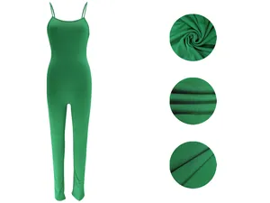 Detailed view of green ribbed fabric on a sexy backless spaghetti strap long jumpsuit
