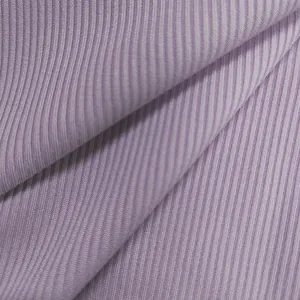 Close-up macro shot showing the soft lavender ribbed fabric texture of this fashion bodysuit