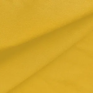 Makroansicht der hochwertigen gelben Stofftextur für ärmellosen Jumpsuit mit weitem Bein