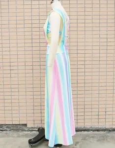 Side view showing the fit and rainbow gradient colors of the two-piece dress on a mannequin
