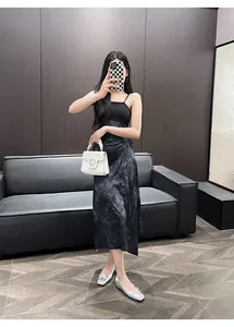 Full-length model shot showcasing silver leather flat shoes with bow accents